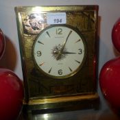 A Jaeger Le Coultre Atmos clock decorated with ships (not in working condition)