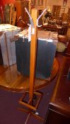 A 1950`s coat and stickstand