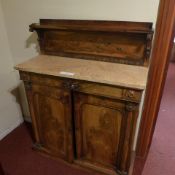 A William IV rosewood chiffonier the raised upstand above marble insert cushion drawer and further