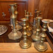 A collection of C19th brass candlesticks
