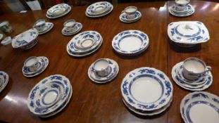 A Royal Cauldron Bristol Ironstone blue dragon pattern dinner set including two tureens cups saucers