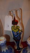 An Italian 1950s tall vase decorated with musicians
