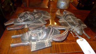 Three early C20th Ghanaian carved wooden masks