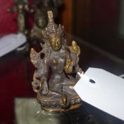 A miniature Tibetan bronze Buddha