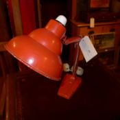 A 1940s red painted angle poise desk lamp