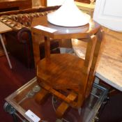 An Art Deco walnut occasional table of two tiers