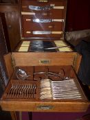 An oak cased Elkington extensive used canteen of cutlery