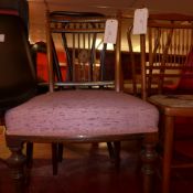 A C19th walnut side chair with stuffover seat upholstered in pink mottled fabric on reeded supports