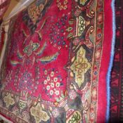 An extreamley fine North East Persian rug 172 cm x 105 cm pendant bird ivory medallion with