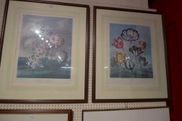 A pair of botanical style prints of tulips and carnations