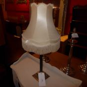 A Corinthium column form table lamp with silk shade
