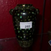 A Chinese vase with black and green mottled glaze