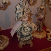A Continental porcelain bust of a gentleman