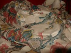A set of four curtains with floral motfits