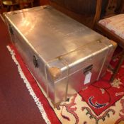An aluminium aviator style trunk with twin handles