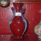 A Chinese vase glazed in red and blue