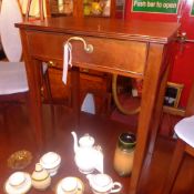 A C19th mahogany side table fitted single drawer raised on square tapering supports