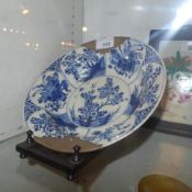 A Chinese Kang XI porcelain blue and white bowl C1680 with Chinese inscription to the base typical