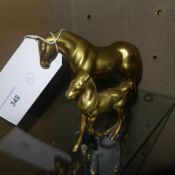 Two brass models of horses