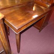 A George III mahogany side table raised on square section supports