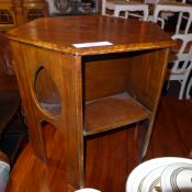 An oak hexagonal two tier book table