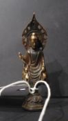 A Chinese bronze standing deity figurine of small size
