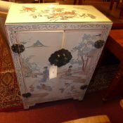 A pair of Chinese lacquered side cabinets fitted pair of panel doors and decorated with social