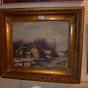 An oil on canvas of a farmhouse signed R.A White in a gilt frame