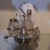 A pair of nickel plated cocktail shakers in the form of wine bottles