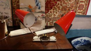 A 1950`s two branch table lamp with red painted conical shades