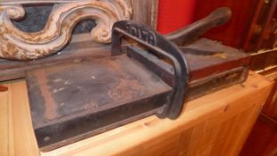 A late C19th cast iron office guillotine together with a similar printers press