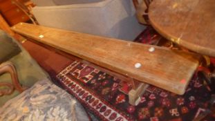 A vintage pine school gymnastics bench