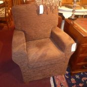 A pair of contemporary armchairs upholstered in brown mottled fabric