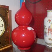 A pair of Chinese of glazed double gourd vases