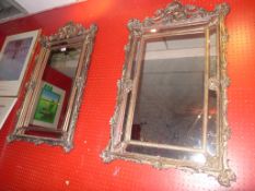 A pair of French looking glasses the rectangular plate within silvered divisional plate with leafy