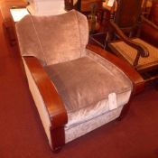 An Art Deco style armchair upholstered in grey velour