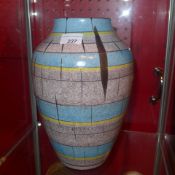 A C19th Vienna twin handled vase decorated with pictoral reserves and heightened in gilt