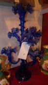 A blue glass epergne of seven branches