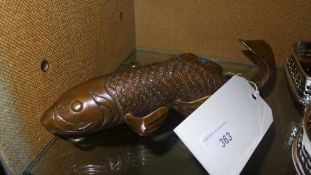 A bronze model of a fish