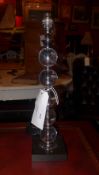 A pair of contemporary table lamps of glass globular form