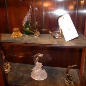 A collection of coloured glass swan form dishes and similar items