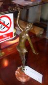 A bronze of an Art Deco style female dancer on marble base