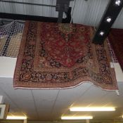 A fine central Persian Kashan carpet pendant petal medallion surrounded by flowers and palmettes