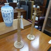 A pair of gilded fluted candlestick