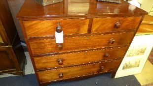 A Victorian mahogany chest having two short above three long drawers on bracket feet