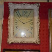 A framed wall clock