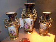 A garniture Paris porcelain vases with h