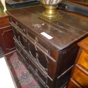 An C18th oak chest arrangement geometric