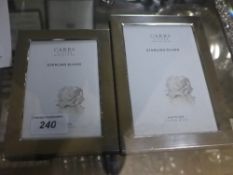 Two silver hallmarked photo frames toget