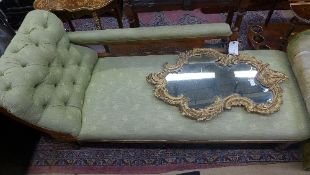 An Edwardian carved walnut chaise longue